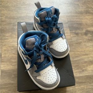 Jordan 1 Mid Toddler sneaker color gray/blue/white size 7C. fairly worn.